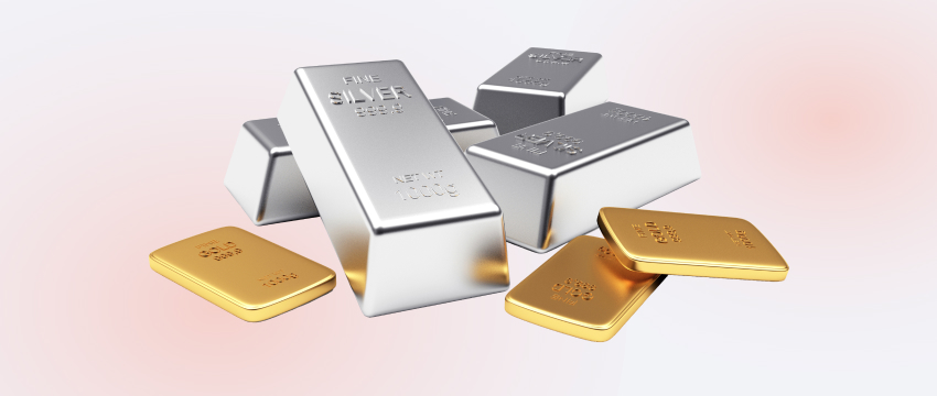 Silver and gold bars, representing the allure of precious metals.