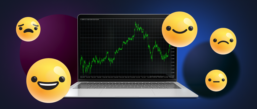 A laptop displaying forex data with emoticons encircling it, representing the realm of trading psychology.