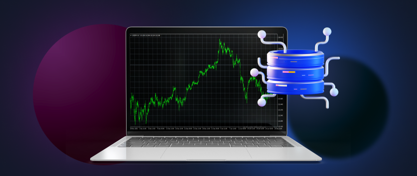 A laptop exhibiting forex data with a server nearby, showcasing the technical infrastructure of forex trading.