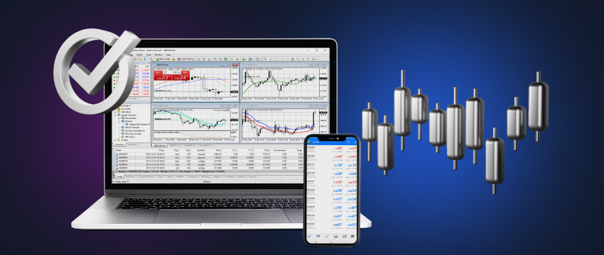 Laptop and phone displaying forex trading charts and data