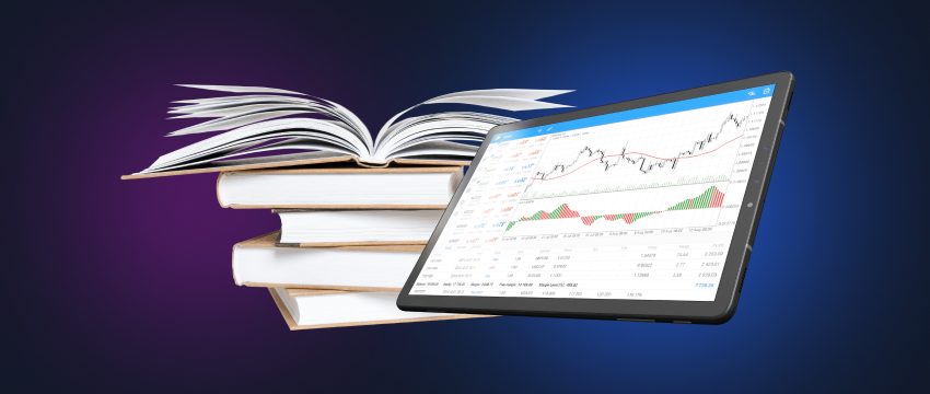 A tablet with live forex trade data alongside informative books.