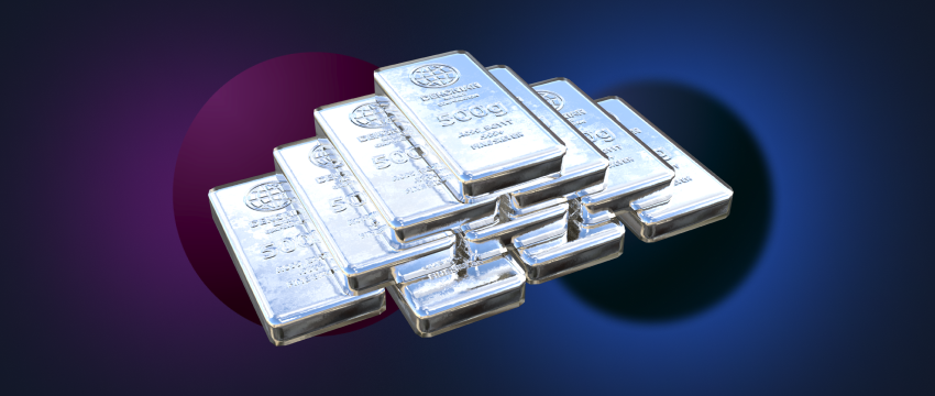 A stack of silver bars of different weights and sizes.