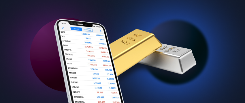 Gold bars alongside a mobile device featuring a metals trading chart.