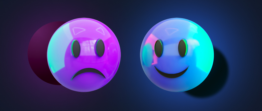 Um par de emoticons coloridos com expressões distintas, representando o espectro emocional dos traders de forex durante a análise.